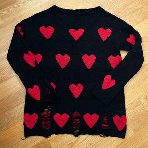 Black Sweater with Red Heart Pattern